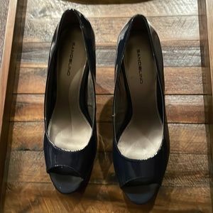 Navy peek a boo toe pumps